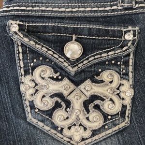 2 pairs of Grace jeans. Boot cut size 25